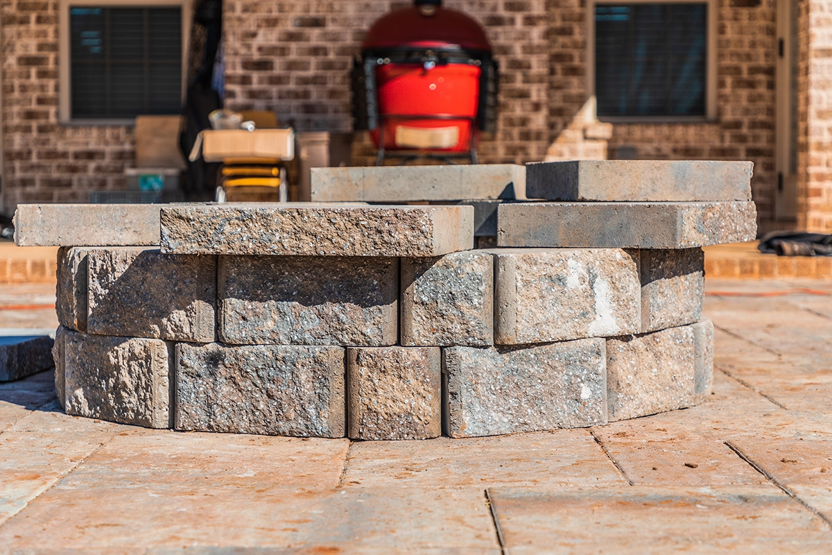 close-up-of-man-made-fire-pit-in-backyard