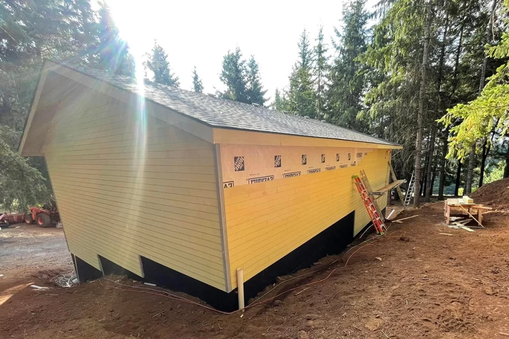 new-yellow-siding-going-up