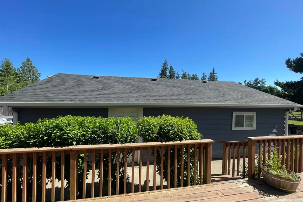 newly-installed-roof-on-blue-house