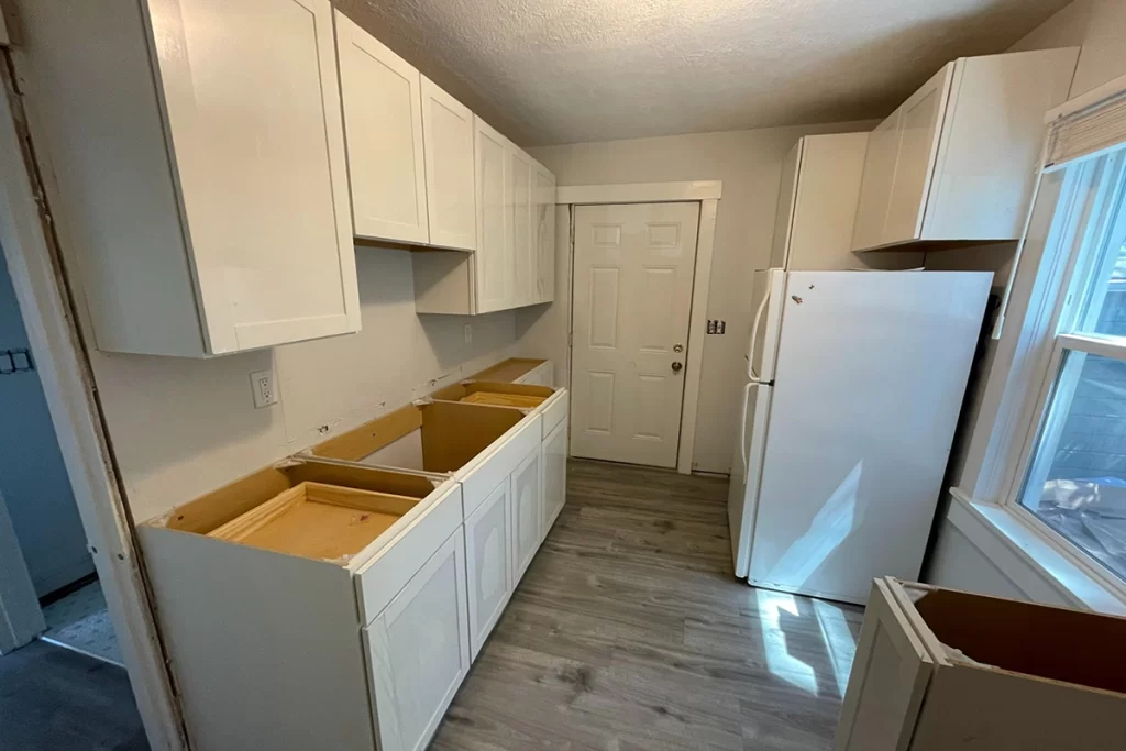newly-installed-white-cabinets-in-kitchen