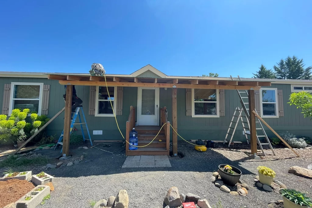 new-patio-cover-in-progress-on-green-house