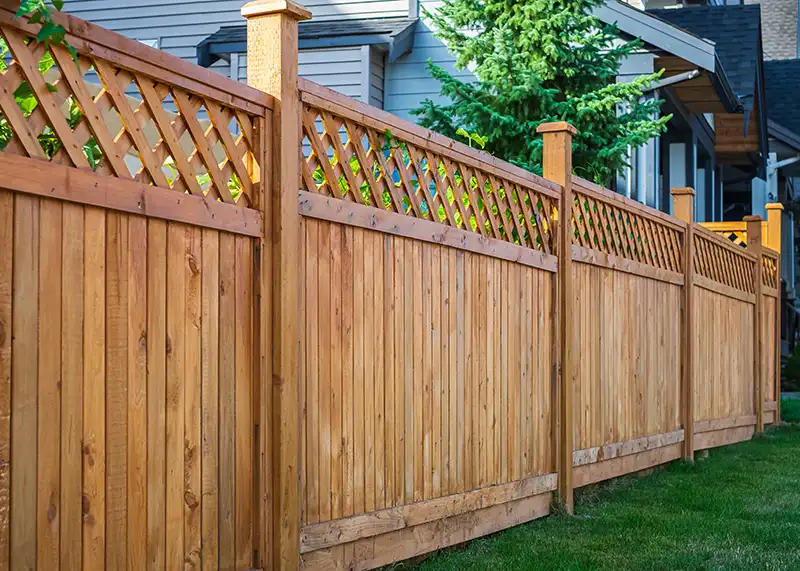 wood residential fence in backyard